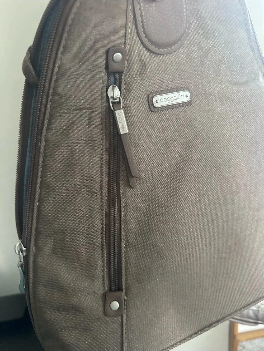 Baggallini Taupe Sling Backpack with Front Zip Pocket travel bag